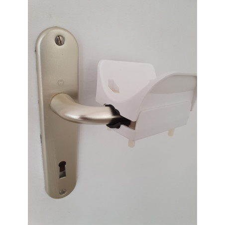 Le coude "Mains libres" pour poignée de porte de marque Jouan est un accessoire de porte pratique conçu pour minimiser le contac