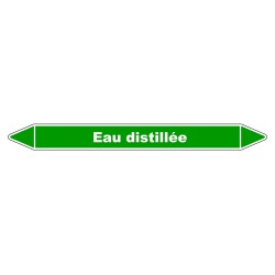 Marqueur de tuyauterie en vinyle laminé indiquant "Eau distillée" pour une identification claire.